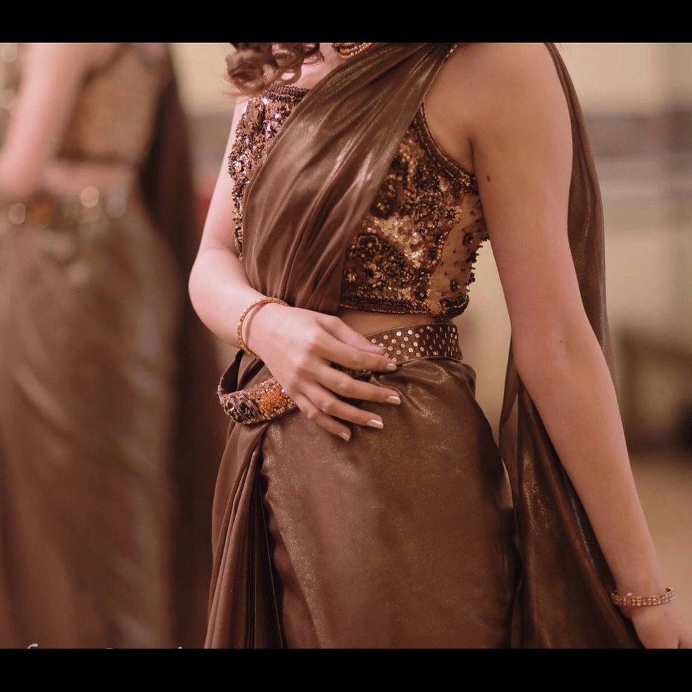 Stylish pure silk Saree with embellished blouse.